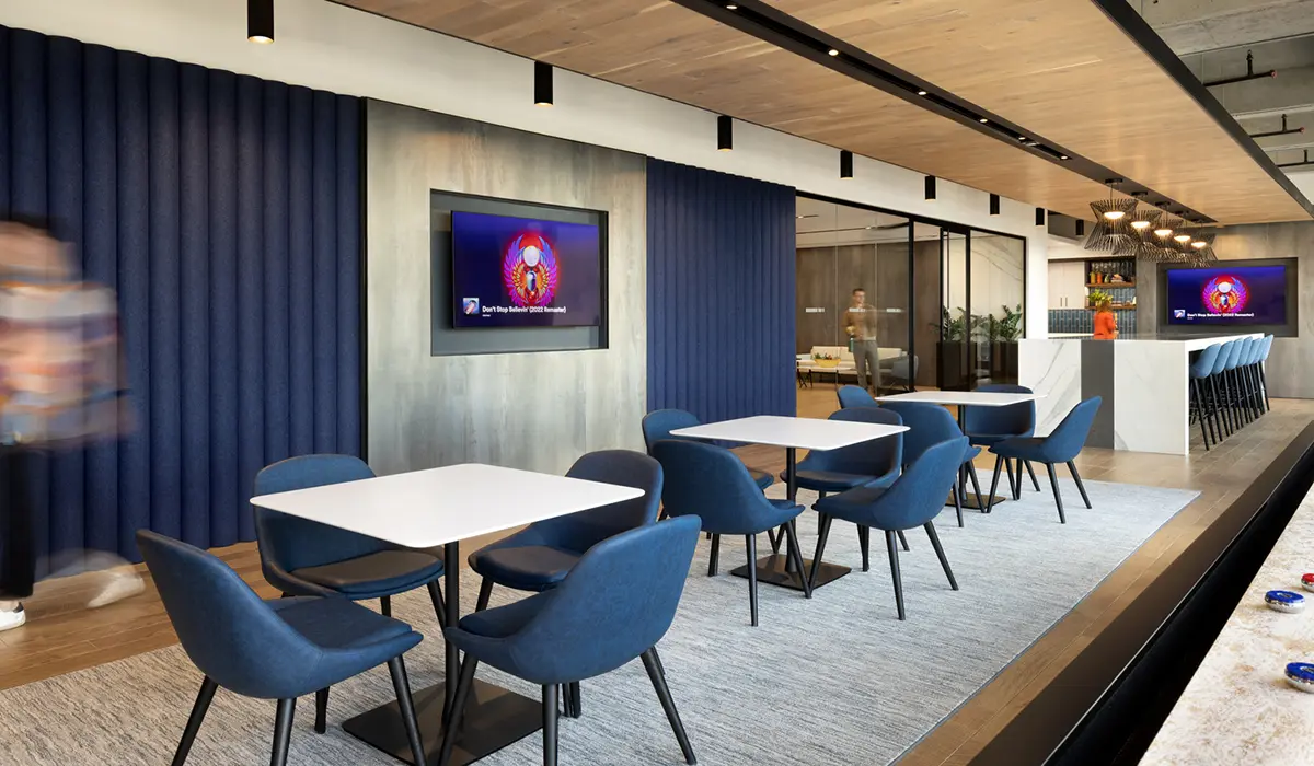 Innovative workplace design with modern seating, meeting spaces, and integrated technology.